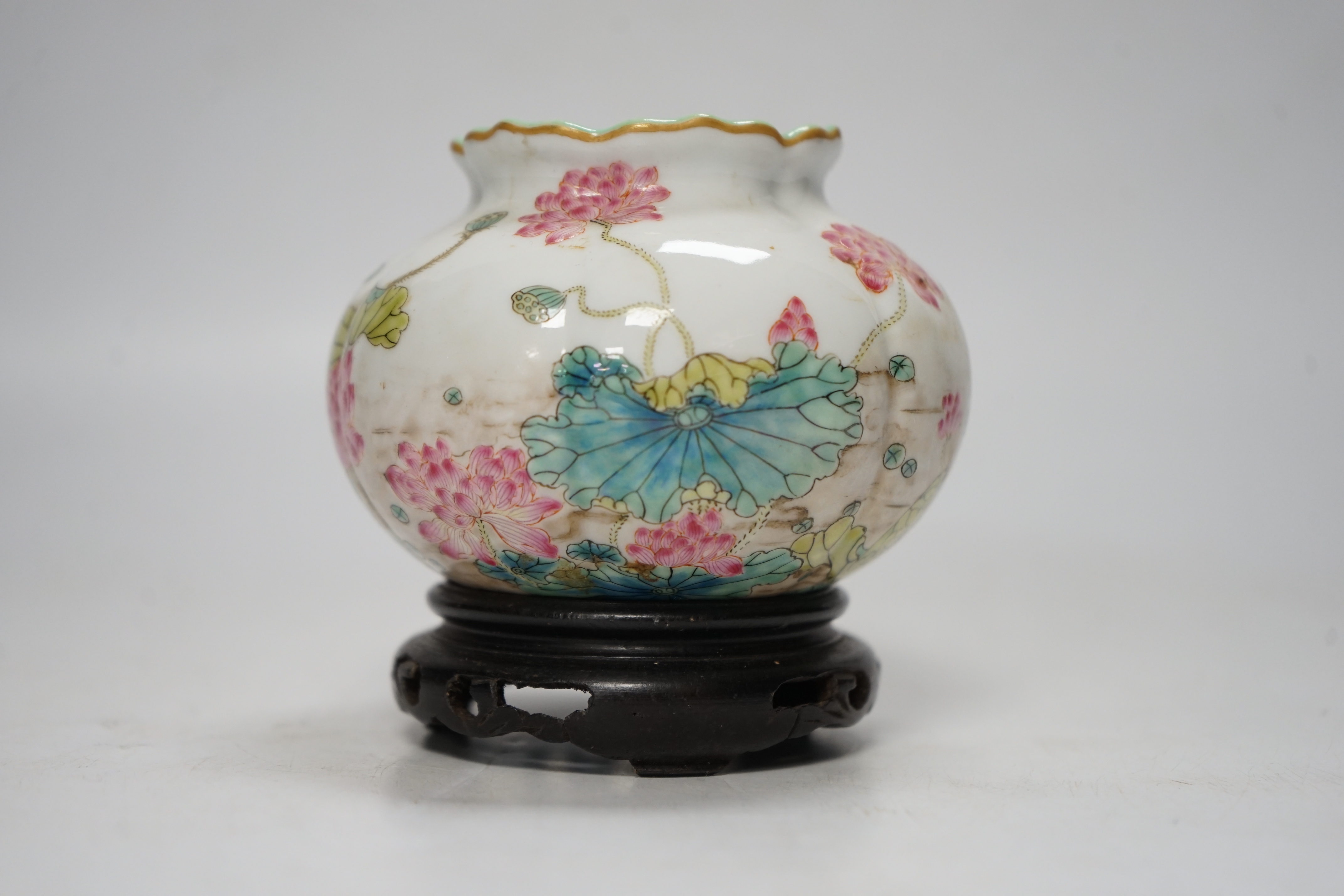 A Chinese famille rose water pot, Qianlong mark but later, on hardwood stand 9cm